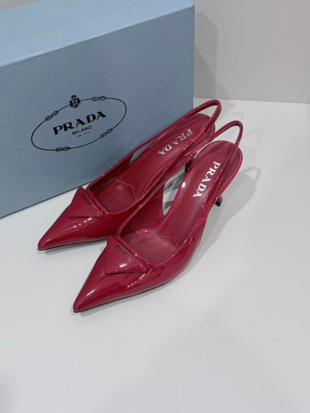 Prada Burgundy Patent Leather Triangle Logo Slingback Kitten Heel Pumps